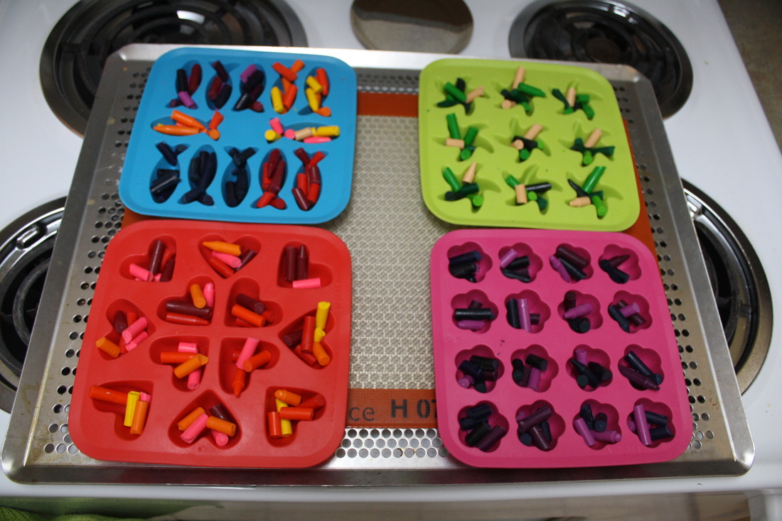 Ikea Ice Cube trays filled with crayons ready to go in the oven 